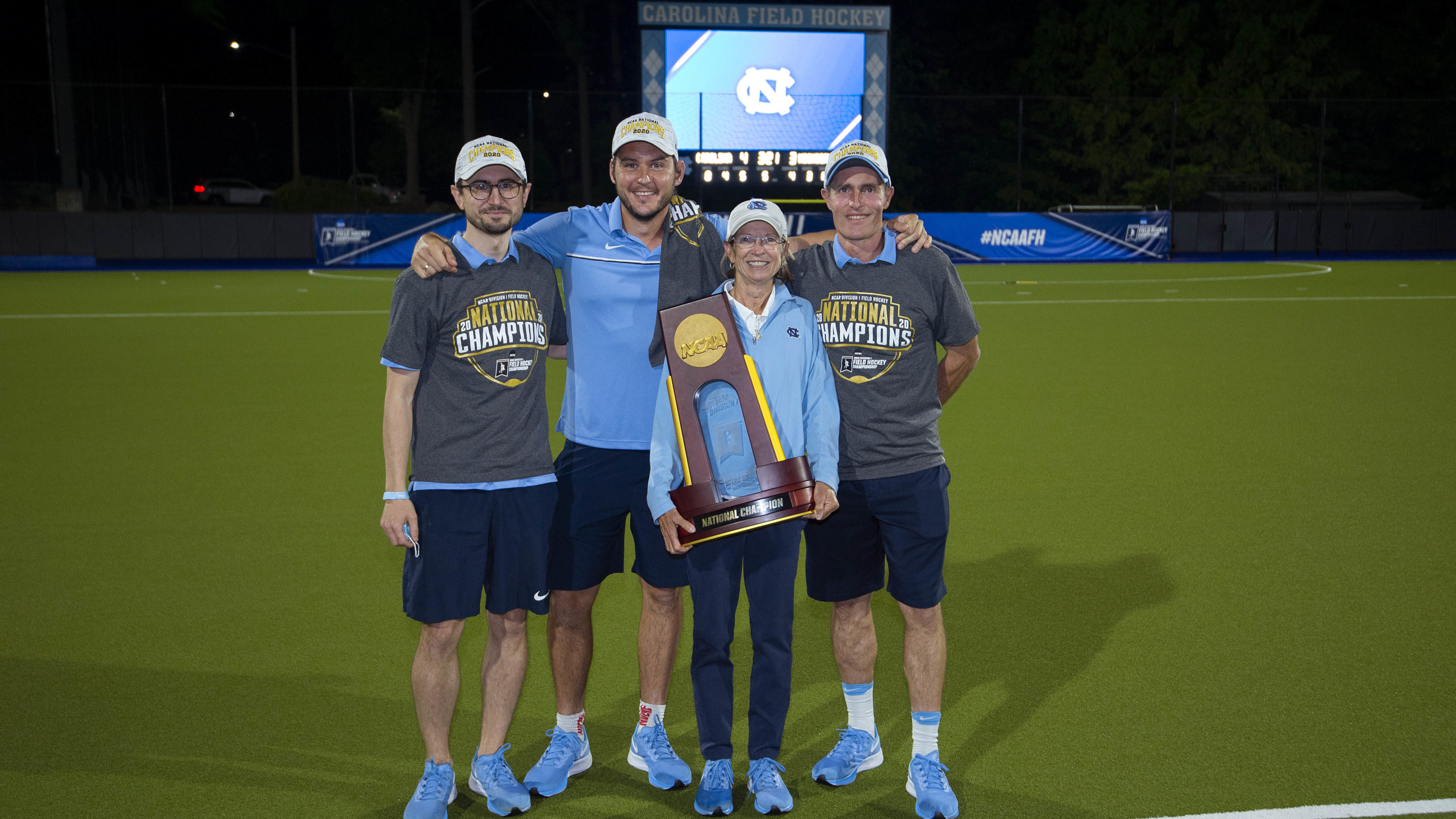 nfhca announces 2020 nfhca division I regional coaching staffs of the year photo with trophy